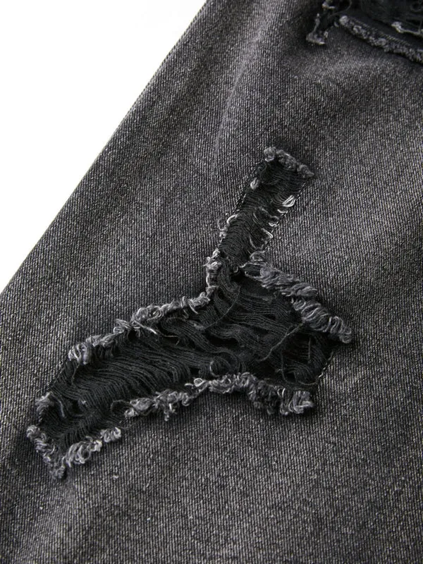 Black ripped boyfriend jeans with washed effect