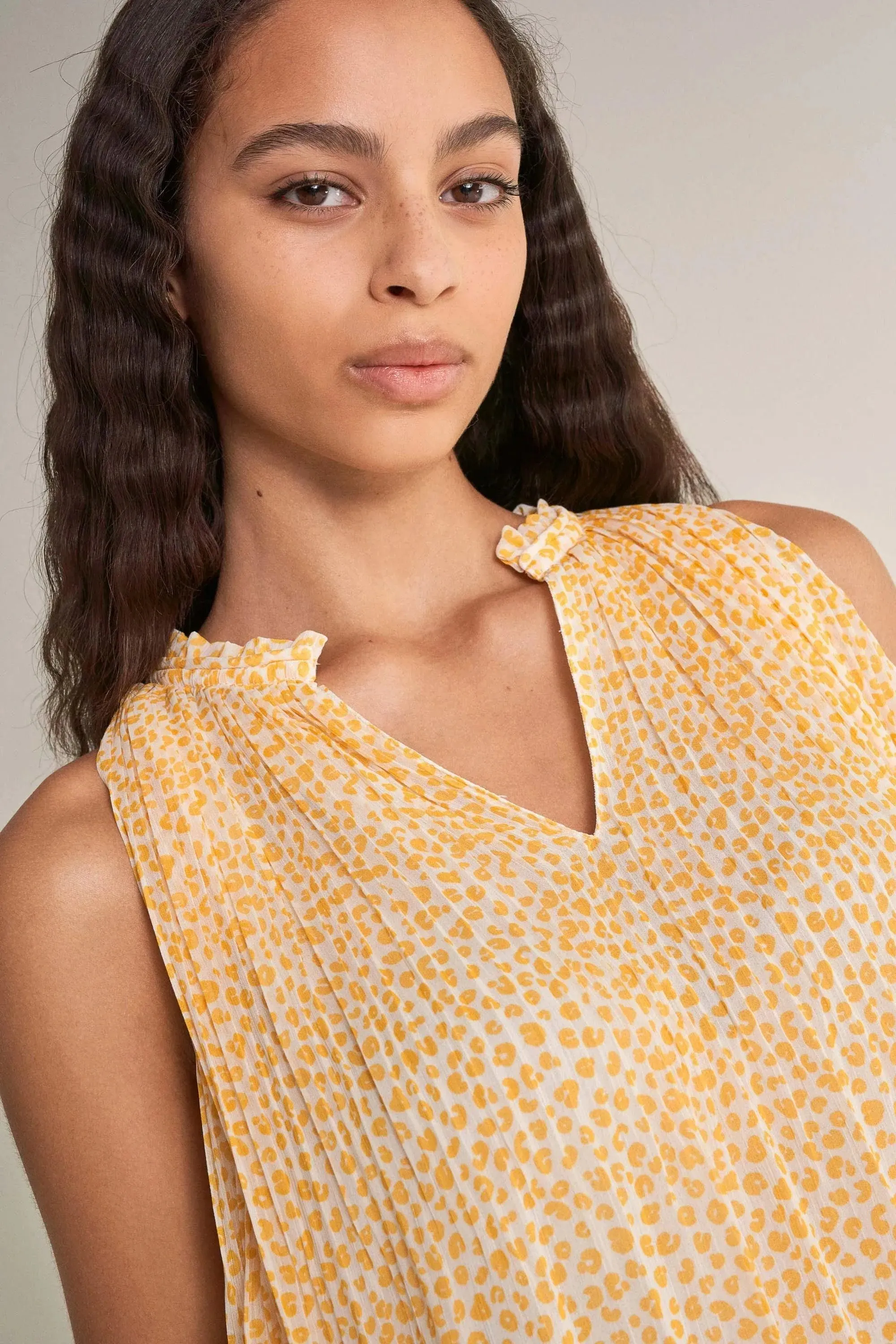 Blusa plisada estampada